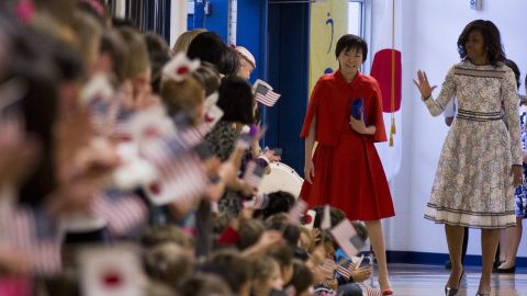 Then-First Lady  Michelle Obama and  Akie Abe meet students during a tour of the Great Falls Elementary School in Great Falls, Virginia on April 28, 2015. 