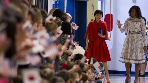 Then-First Lady Michelle Obama and Akie Abe meet students during a tour of the Great Falls Elementary School in Great Falls, Virginia on April 28, 2015.