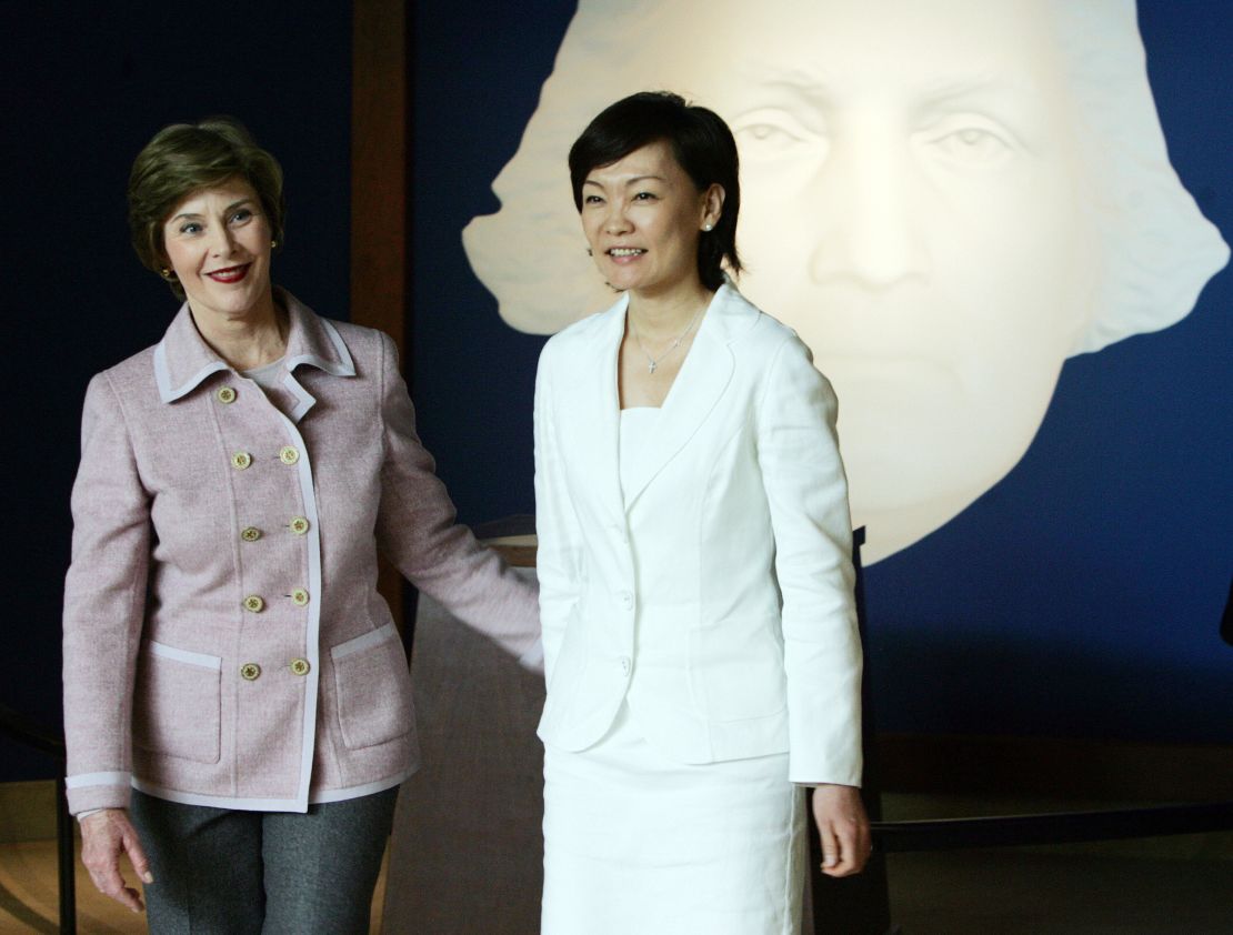 First lady Laura Bush, and Akie Abe, wife of Japanese Prime Minister Shinzo Abe, tour Mount Vernon estate. 