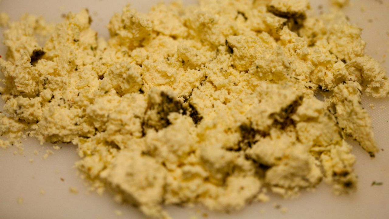 Crumbly cheese rolled in herbs.