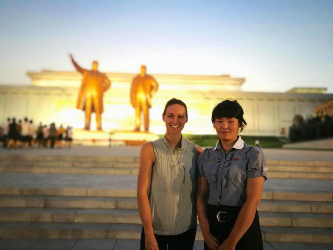 Cassie De Pecol in North Korea with her tour guide. She came to the country on a three-day organized tour with a Chinese tour group based out of Beijing. 