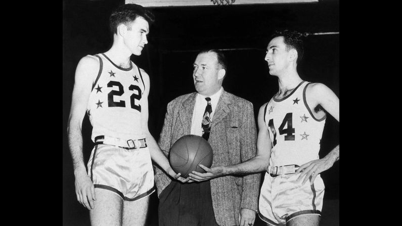<strong>First All-Star MVP:</strong> Ed Macauley, left, was MVP of the first NBA All-Star Game, which was played in 1951. Boston teammate Bob Cousy, right, was also on the team that year. Between them here is Walter Brown, the Celtics' original owner.
