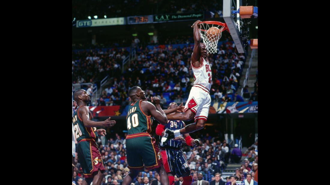 <strong>Triple-doubles:</strong> Michael Jordan dunks the ball during the 1997 All-Star Game in Cleveland. He finished with 14 points, 11 rebounds and 11 assists for the first triple-double in All-Star history. Only two other players have accomplished the feat: LeBron James in 2011 and Dwayne Wade in 2012.