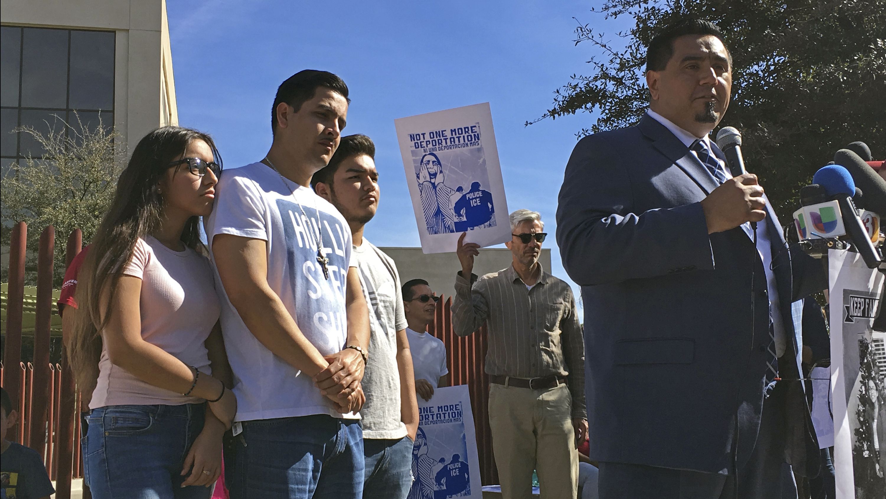 The Garcia de Rayos family stands with lawyer Ray Maldonado outside the Phoenix ICE office Thursday.