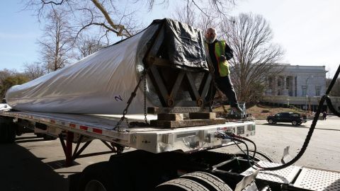 A spool holding one half of the painting prepares to leave Atlanta's Grant Park on Friday.