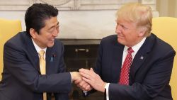 WASHINGTON, DC - FEBRUARY 10:  (AFP OUT) U.S. President Donald Trump (R) and Japanese Prime Minister Shinzo Abe pose for photographs before bilateral meetings in the Oval Office at the White House February 10, 2017 in Washington, DC. Trump and Abe are expected to discuss many issues, including trade and security ties and will hold a joint press confrence later in the day.  (Photo by Chip Somodevilla/Getty Images)