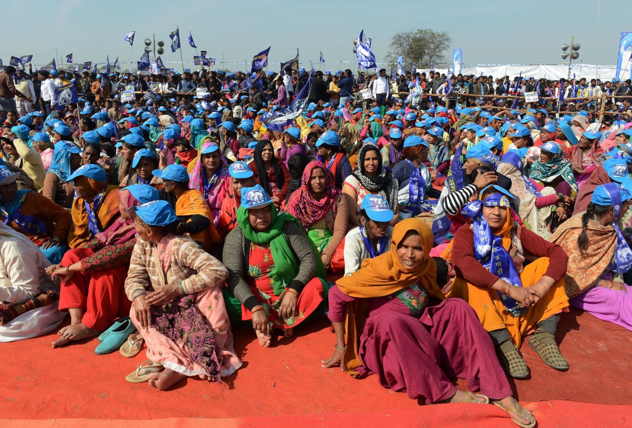 Bahujan Samaj Party supporters listen to leader Mayawati during an election rally on February 7, 2017. Mayawati is seeking a fifth term as Chief Minister. She was beaten convincingly in 2012 by the Samajwadi Party.