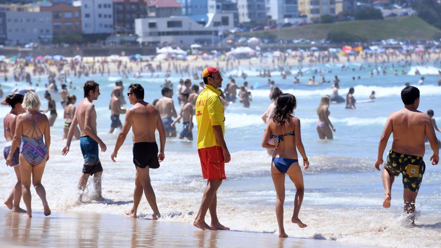 A lifeguard supervises swimmers at Sydney's Bondi Beach on Saturday, February 11.