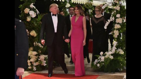 The Trumps arrive for a Red Cross gala at their Mar-a-Lago estate in February 2017.