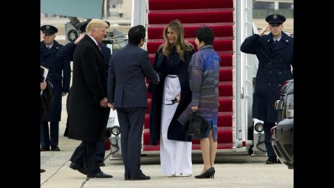 The first lady shakes hands with Japanese Prime Minister Shinzo Abe before boarding Air Force One with her husband in February 2017. The Trumps hosted the Abes at their Mar-a-Lago estate in Palm Beach, Florida.