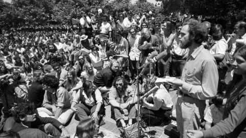 Mario Savio, right, one of the leaders of the 1964-65 Free Speech Movement at the <strong>University of California-Berkeley</strong>, speaks at a "Peoples Park" rally on campus in June 1969. The movement, which protested the university's ban on student political activity, soon spread to other campuses.