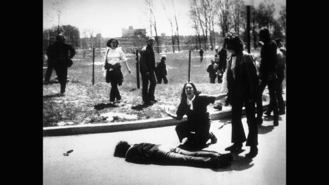 Mary Ann Vecchio screams as she kneels by the body of student Jeffrey Miller, shot by National Guardsmen on May 4, 1970, on the campus of <strong>Kent State University</strong> in Kent, Ohio. The National Guard had been called in to help quell several days of unrest on campus by crowds of demonstrators protesting the war in Vietnam. This photo was published worldwide, won a Pulitzer and helped sway public sentiment against the war.