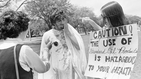 Dorothy Goldsmith and Rita Webb squirt Kenneth Opat with oil in 1970 at <strong>Tulane University</strong> in New Orleans, where students tagged Louisiana's oil industry with the "polluter of the month" award.  The demonstration on April 22 of that year was part of the first annual observance of Earth Day.  