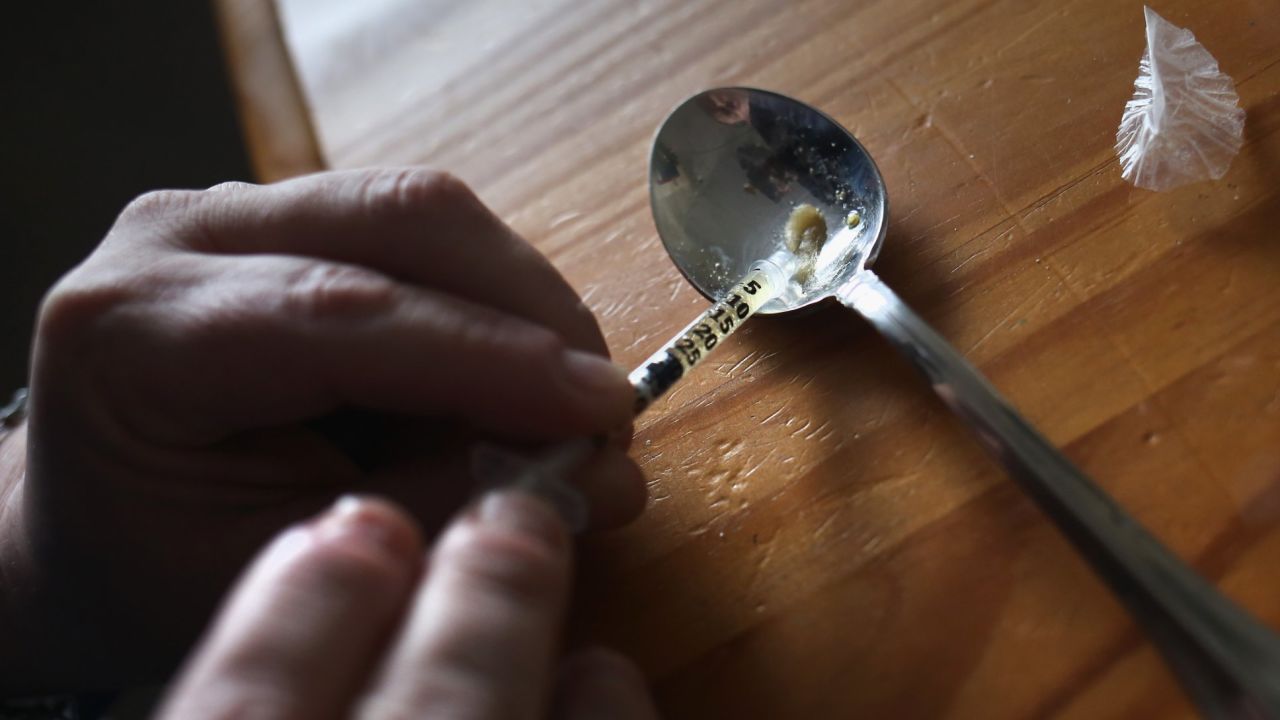 NEW LONDON, CT - MARCH 23:  A heroin user prepares to inject himself on March 23, 2016 in New London, CT. Communities nationwide are struggling with the unprecidented heroin and opioid pain pill epidemic. On March 15, the U.S. Centers for Disease Control (CDC), announced guidelines for doctors to reduce the amount of opioid painkillers prescribed nationwide, in an effort to curb the epidemic. The CDC estimates that most new heroin addicts first became hooked on prescription pain medication before graduating to heroin, which is stronger and cheaper.  (Photo by John Moore/Getty Images)