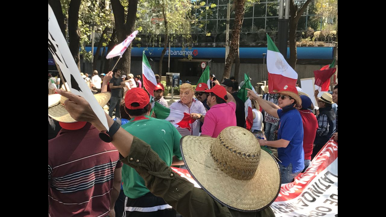 Protesters march in Mexico City.