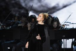 Adele performs a tribute to George Michael.