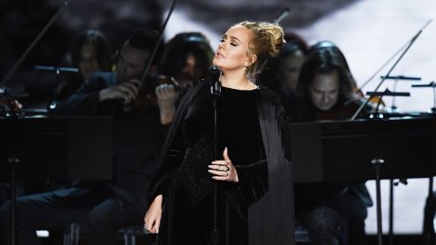 Adele performs a tribute to George Michael.