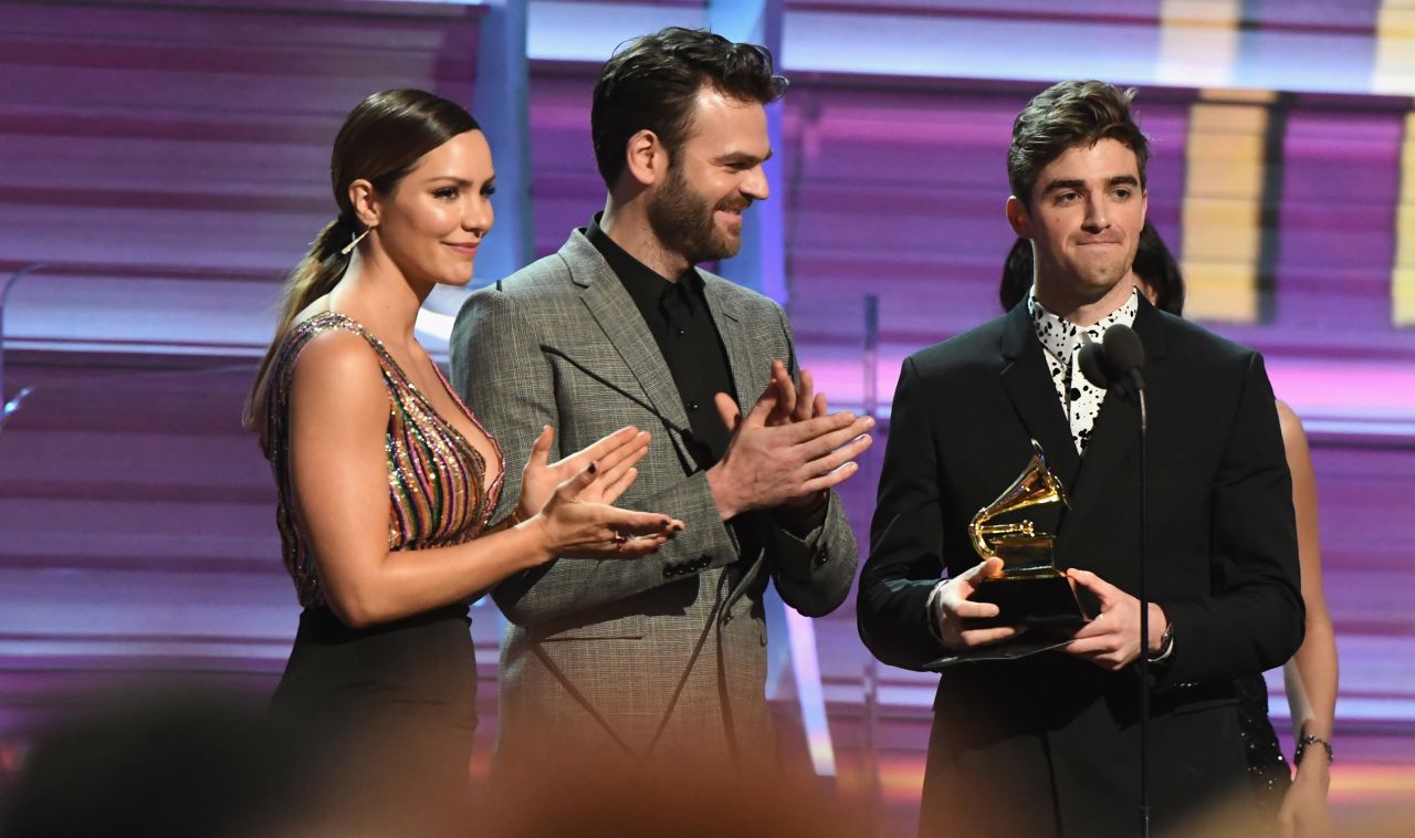 Katharine McPhee joins Alex Pall and Andrew Taggart of The Chainsmokers as they present the Grammy for best rock song. The award went to the late David Bowie for his song "Blackstar."