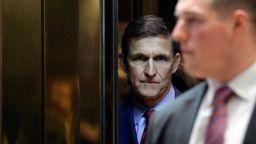Retired Lieutenant General Michael Flynn, White House national security adviser-designate, stands in the elevator at the Trump Tower in New York, U.S., on Monday, Dec. 5, 2016. More than six weeks before his inauguration, President-elect Donald Trump is already carrying out his promise to make U.S. foreign policy less predictable with a series of moves that are keeping America's adversaries, as well as its friends, off-balance. Photographer: John Angelillo/Pool via Bloomberg