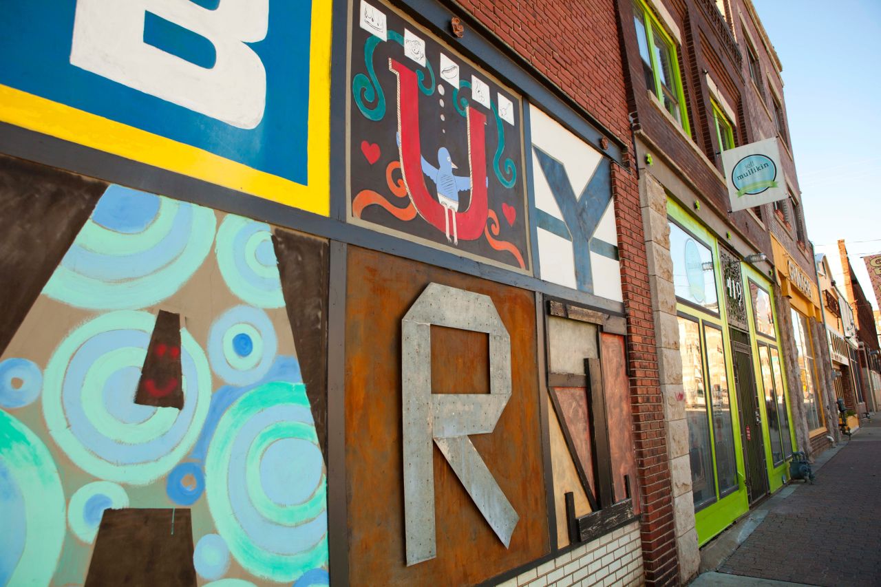 On the first Friday of each month, Kansas City's Crossroads Arts District hosts an art crawl, where visitors enjoy galleries, street performers and food trucks.