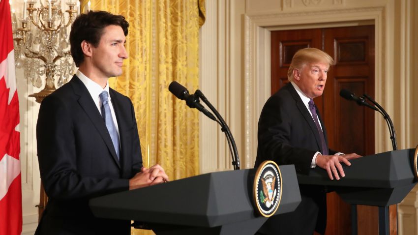 US President Donald Trump (R) and Canadian Prime Minister Justin Trudeau participate in a joint news conference in the East Room of the White House on February 13, 2017 in Washington, DC.