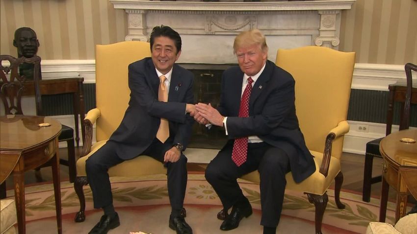 trump handshake power grab origwx bw_00000000.jpg