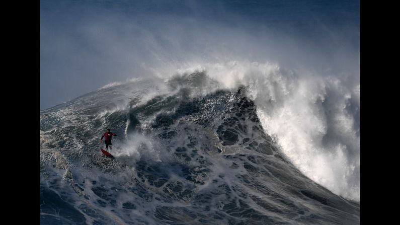 Rafael Tapia surfs a big wave in Praia do Norte, Portugal, on Friday, February 10.