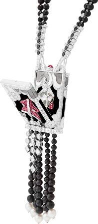 This single-edition secret timepiece is worn around the neck and includes round, square and baguette-cut diamonds, rubies, onyx, and mother-of-pearl.