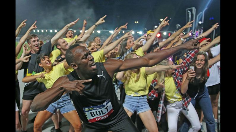 Olympic champion Usain Bolt celebrates after winning a 150-meter race at a Nitro Athletics meet in Melbourne on Saturday, February 11.