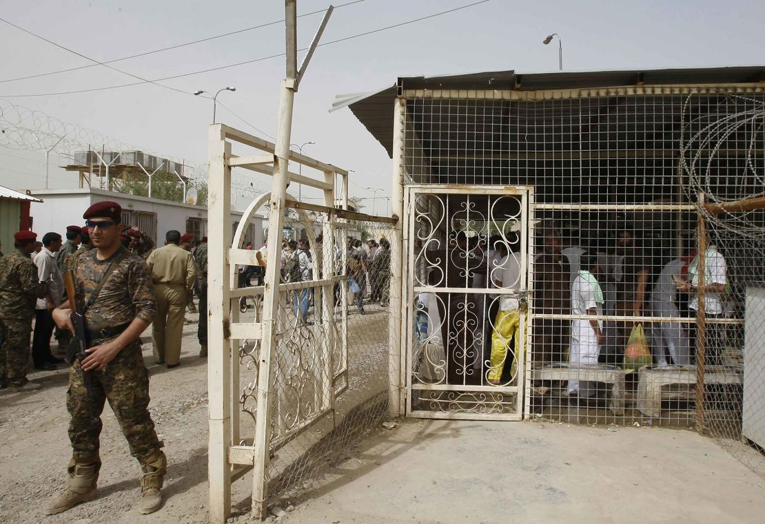 An Iraqi soldier stands guard at Al-Rusafa detention facility in Baghdad on April 29, 2010.