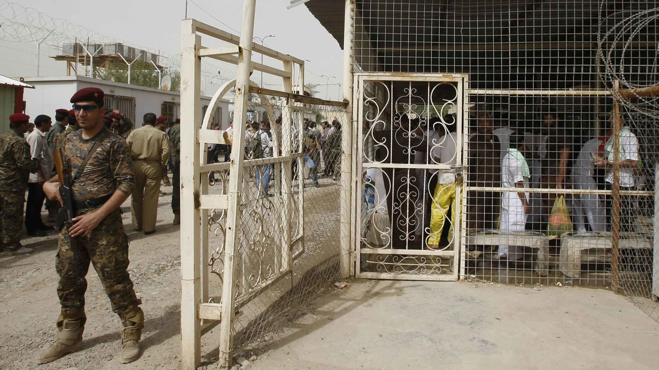 An Iraqi soldier stands guard at Al-Rusafa detention facility in Baghdad on April 29, 2010.