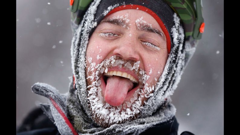 David Cassidy enjoys the moment after finishing an 18-mile bike race in Carrabassett Valley, Maine, on Saturday, February 11. Riders at the Fat Tire Festival had to endure heavy snowfall and low temperatures as <a href="index.php?page=&url=http%3A%2F%2Fwww.cnn.com%2F2017%2F02%2F09%2Fus%2Fgallery%2Fnortheast-snowstorm%2Findex.html" target="_blank">the Northeast was hit with a winter storm.</a>