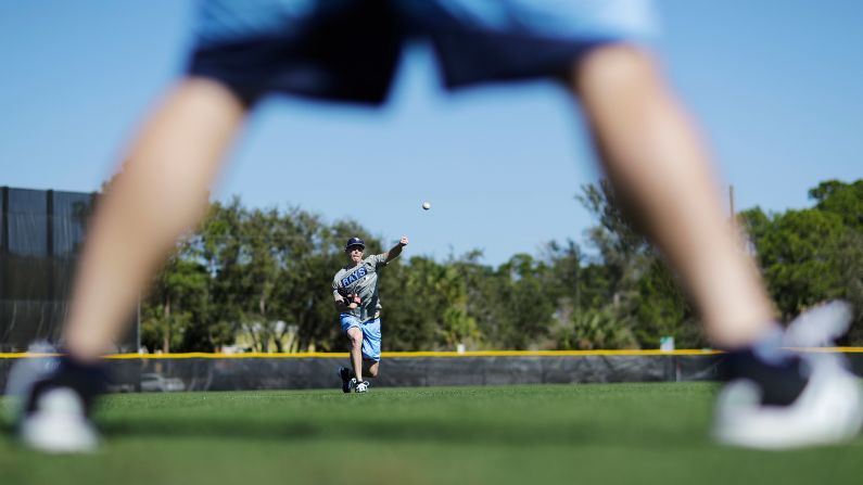 Tampa Bay pitcher Ryan Yarbrough throws the ball during an informal workout in Port Charlotte, Florida, on Sunday, February 12. Spring training begins this week for Major League Baseball.