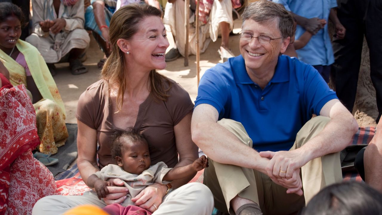Bill and Melinda Gates visit with residents of the village of Jamsaut in India in 2011.