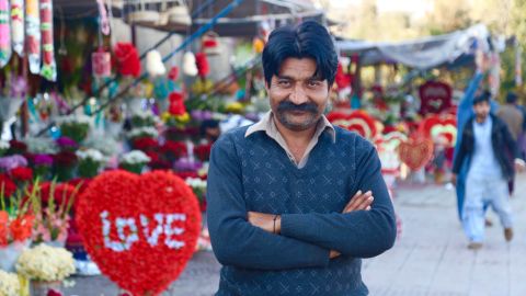 Mohammad Naveed who runs a roadside flower shop tells CNN he's invested close to $2000 on buying flower supplies for February 14.
