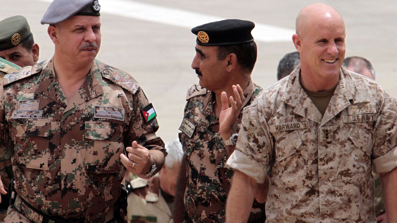 Then-Navy Vice Admiral Robert S. Harward (right) attends the "Eager Lion" joint military exercise at the King Abdullah Special Operations Training Centre in Amman on May 27, 2012.