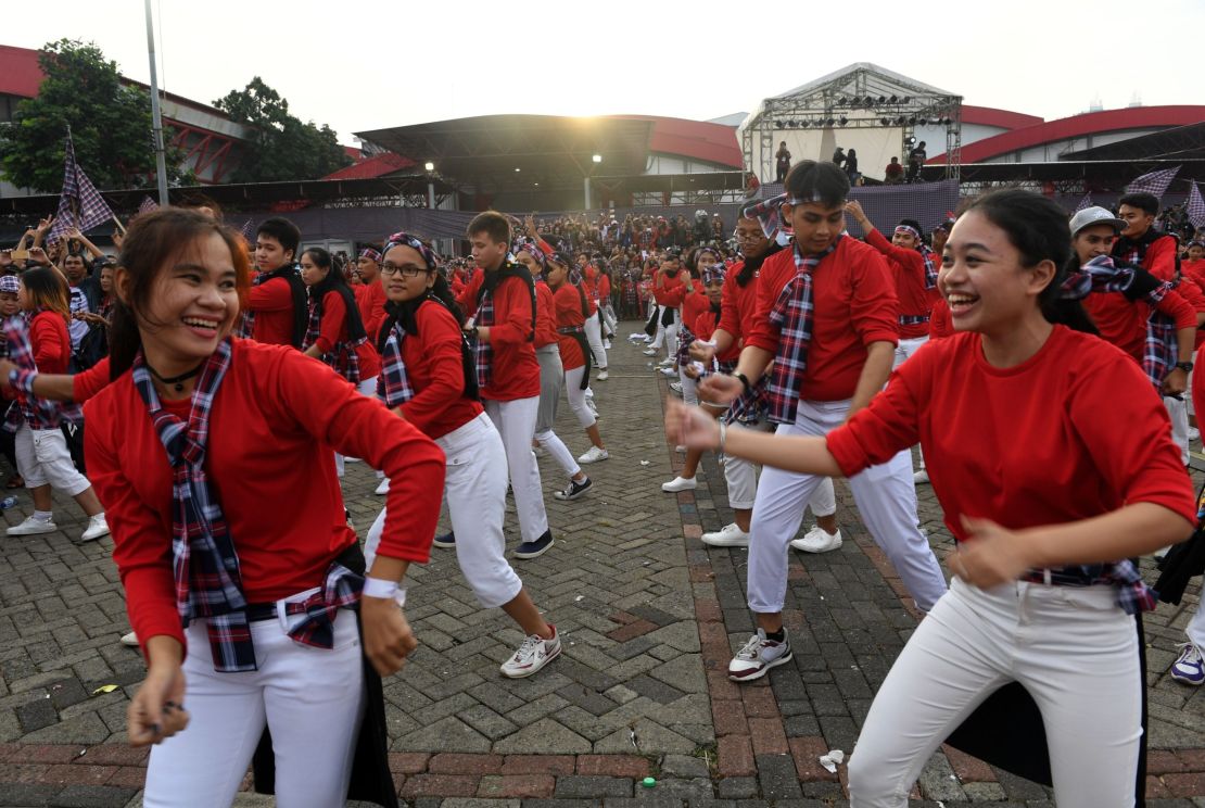 Dancers perform for supporters of the Jakarta governor at his final campaign rally Saturday.