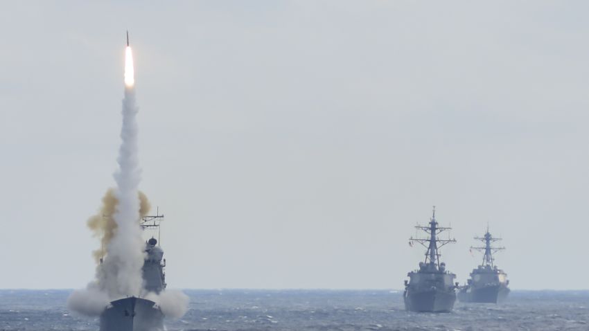 160315-N-DQ503-070ATLANTIC OCEAN (March 15, 2016) -- Guided-missile cruiser USS Monterey (CG 61), left, launches a Standard Missile-2 (SM-2) to destroy an advanced high-speed target while USS Stout (DDG 55) and USS Mason (DDG 87) transit formation during a live-fire test of the ship's Aegis weapons systems. The live-fire event was conducted during the Eisenhower Carrier Strike Group Composite Training Unit Exercise (COMPTUEX), the final certification event prior to deployment. As the world's premier fleet-aria air defense weapon, SM-2 is an integral part of the layered defense that protects the world's naval assets and gives warfighters a greater reach in the battlespace. SM-2 variants are lethal against subsonic, supersonic, low- and high-altitude, high-maneuvering, diving, sea-skimming, anti ship cruise missiles, fighters, bombers, and helicopters in an advanced electronic countermeasures environment. SM-2 has an extensive area and self-defense flight test history with more than 2,650 successful flight tests from domestic and international ships. (U.S. Navy Photo by Chief Damage Controlman Andrae L. Johnson/Released)