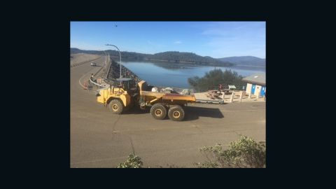CNN's Paul Vercammen took this photo of rocks being carried to fill a spillway.