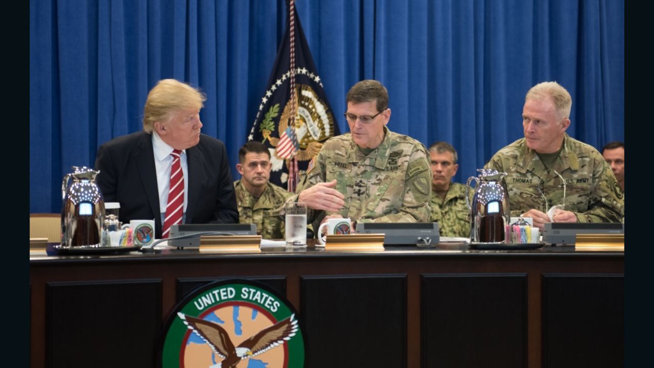 President Donald Trump talks with Gen. Joseph Votel, commander of US Central Command Commander, and Gen. Raymond "Tony" Thomas, US Special Operations Command Commander at MacDill, Air Force Base, FL, Feb. 6, 2017 (Photo Department of Defense)
