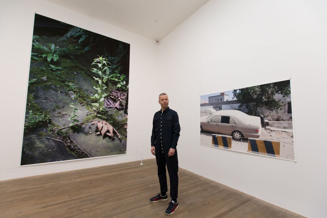 Wolfgang Tillmans stands in his exhibition at London's Tate Modern.