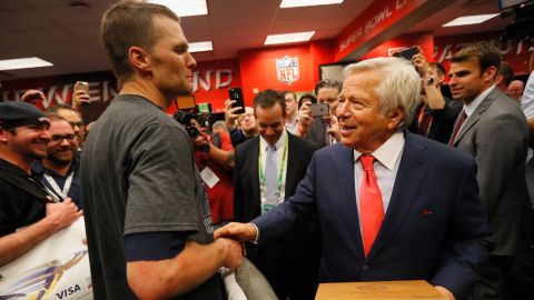 Tom Brady celebrates with New England Patriots owner Robert Kraft in the locker room after defeating the Atlanta Falcons during Super Bowl 51 on February 5, 2017 in Houston, Texas.