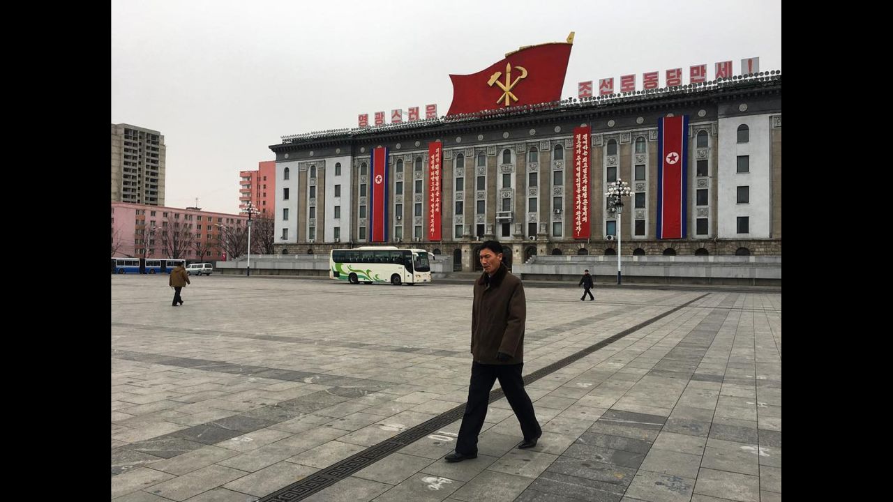 The symbol of North Korea's sole political party, the Korean Workers' Party, can be seen atop a government building in Pyongyang. 