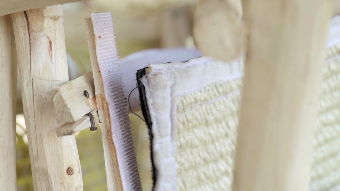 Velcro attaches the anti-mosquito fabric to the bottom of the chair.