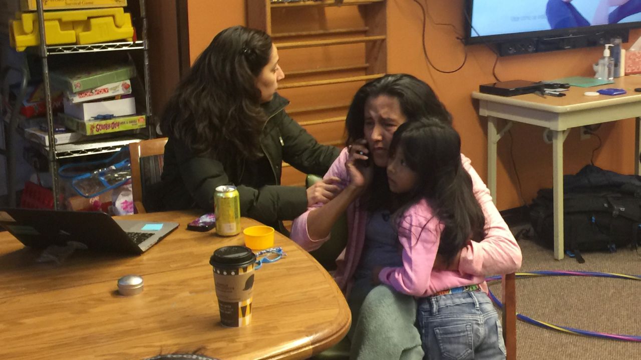 Vizguerra, with her daughter Zury and a friend, learns by phone from her lawyer that the request for an extension on the stay of her deportation order was denied.