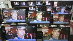 TV screens show pictures of Kim Jong Nam, the half-brother of North Korean leader Kim Jong Un, at the Yongsan Electronic store in Seoul, South Korea, Wednesday, Feb. 15, 2017. Kim was assassinated at an airport in Kuala Lumpur, telling medical workers before he died that he had been attacked with a chemical spray a Malaysian official said Tuesday. (AP Photo/Ahn Young-joon)