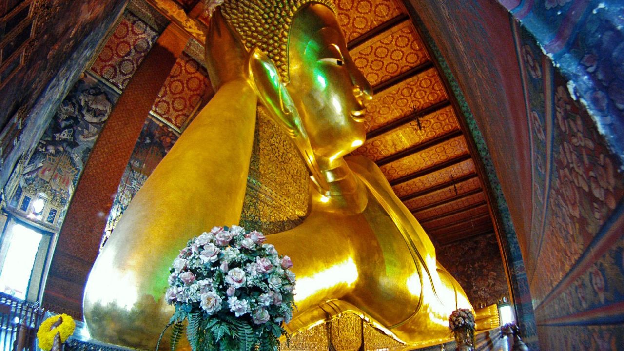 The challenge at Wat Pho is to fit all 26 meters of its Reclining Buddha into a single photograph.