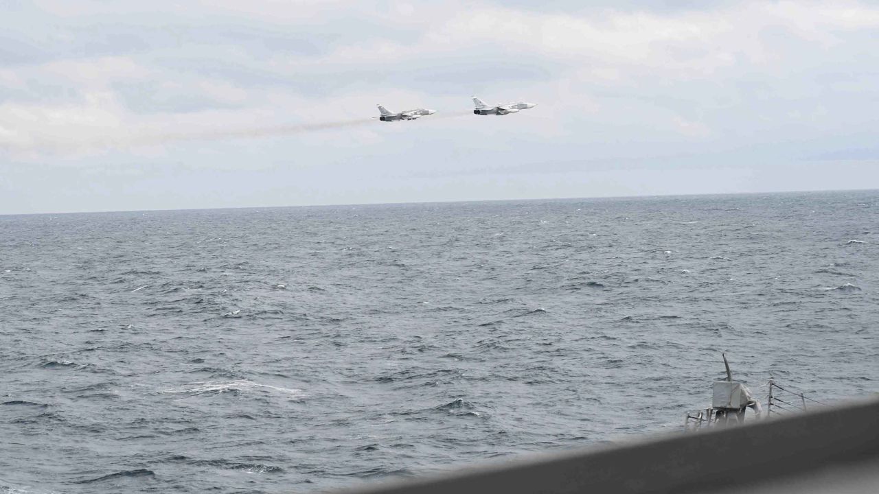 A pair of Russian Su-24 jets pass in close proximity to the USS Porter on February 10, 2017.