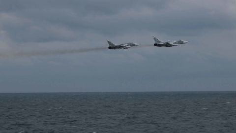 Two Russian Su-24 jets pass close to the USS Porter in the Black Sea last week.