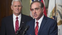 Secretary of Veterans Affairs David Shulkin speaks alongside US Vice President Mike Pence (L) during a ceremony in the Eisenhower Executive Office Building adjacent to the White House in Washington, DC, February 14, 2017. / AFP / SAUL LOEB        (Photo credit should read SAUL LOEB/AFP/Getty Images)